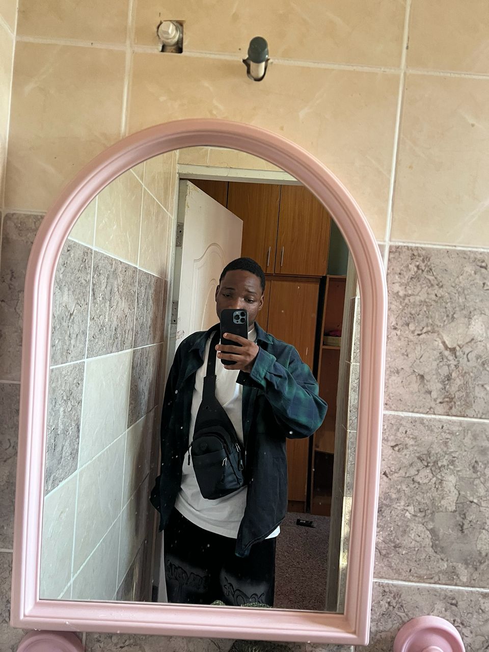 Faruq Etamesor taking a mirror portrait